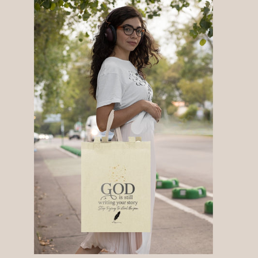 GOD Is Still Writing Canvas Tote